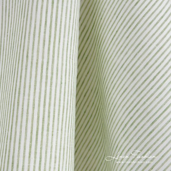 Linen fabric in vertical green stripes