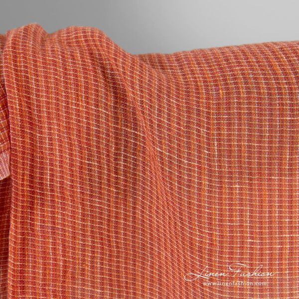 Transparent linen fabric in orange melange, specially washed