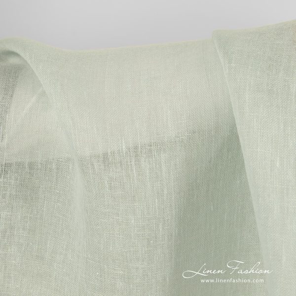 Pale green dyed 100% linen fabric.