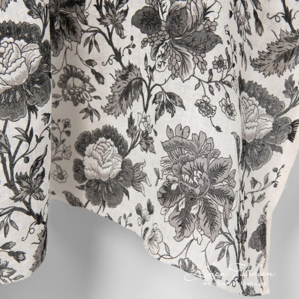 100% linen fabric with black flowers.