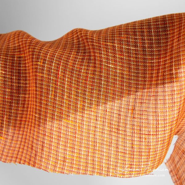 Orange linen fabric in gauze pattern