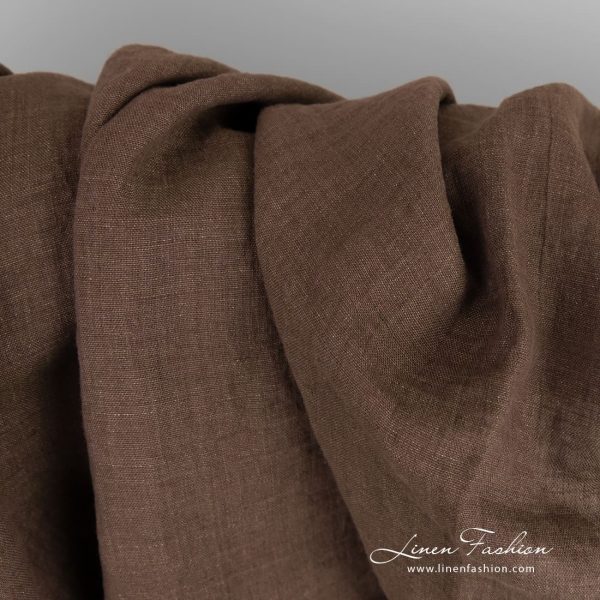 Linen fabric in green and violet melange, plain weave pattern