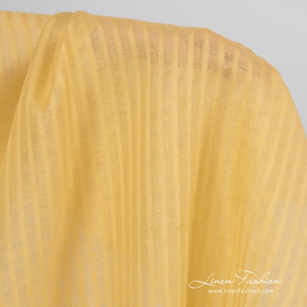 Striped 100% linen fabric in yellow.