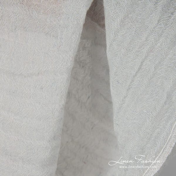 Washed pale green fabric.