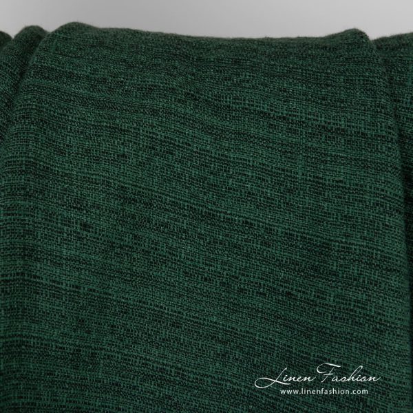Forest green linen fabric in tweed pattern