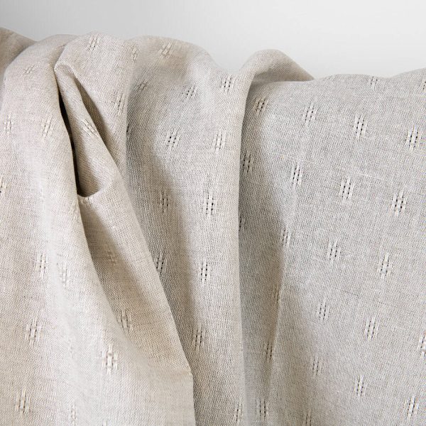 Linen cotton fabric beige with openwork pattern, with undyed linen